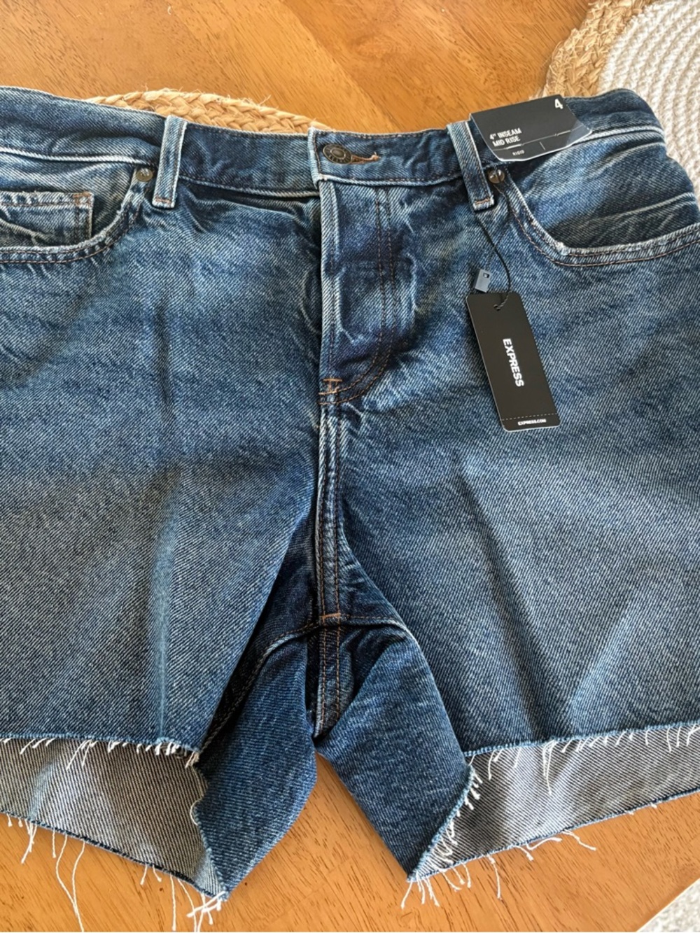 Express Mid-Rise Denim Shorts - Medium Blue. New with Tags. Cross posted. Size 4
